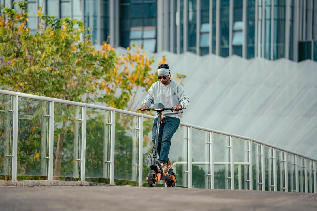 KuKirin electric scooter rider enjoying a relaxed city commute