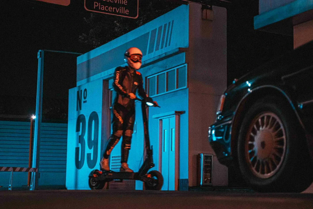 Kukirin electric scooter rider enjoying an evening urban ride