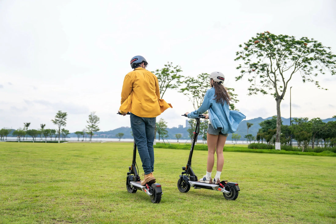 KuKirin scooter group ride in an urban park
