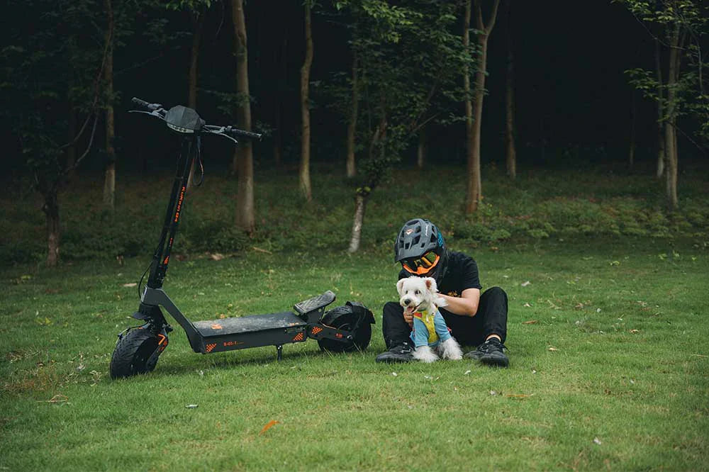 KuKirin electric scooter rider enjoying a weekend countryside ride
